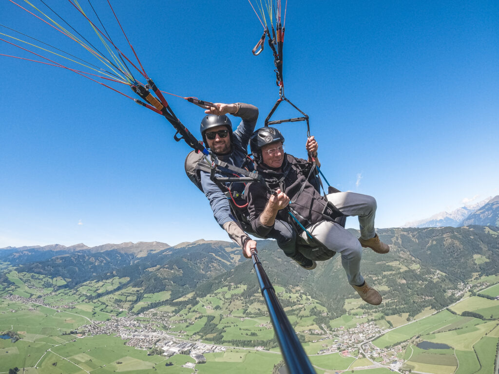 Regular guest and Sepp on a superior flight high above the valley